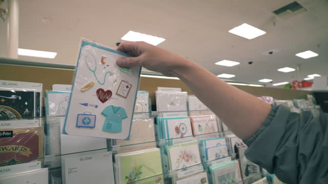 Choosing a Postcard: A Slow Motion Moment in a Card Store