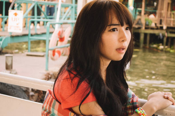 istock cute short thai woman 1906660350