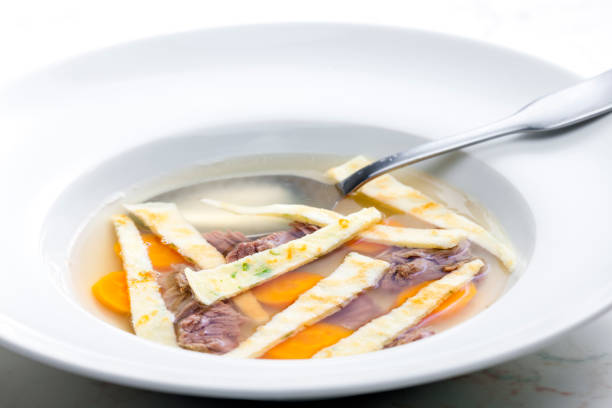beef soup with celestine noodles and carrot