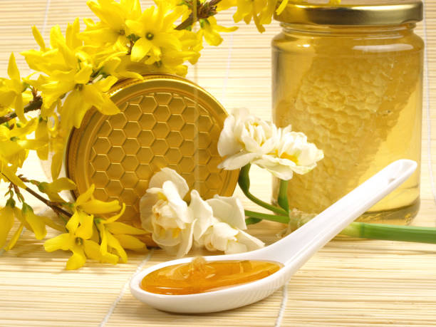 istock Honey in a Spoon - Blossom 1906691169