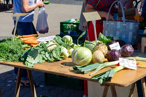 Traditional green market stall with fresh vegetables in Bologna, Italy