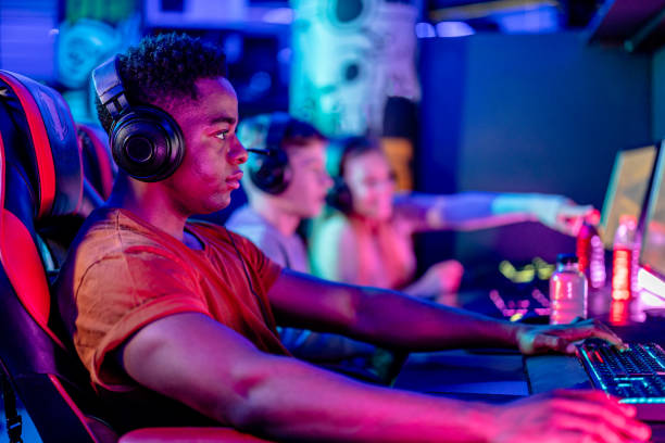 istock Diverse trio tackles eSports gaming challenge 1906709507