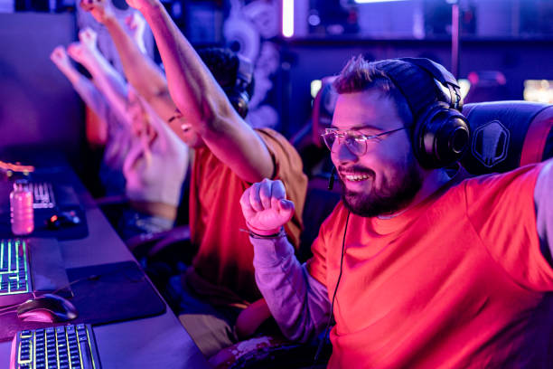 istock Victorious cheer in multiplayer gaming event 1906712172