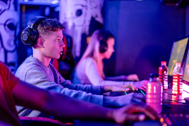 istock Shared gaming adventure in eSports arena 1906726855