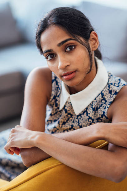 Beautiful Indian traditional girl posing on white background.
