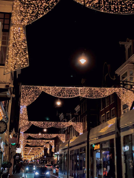 istock Christmas lights decorating the streets 1906739631