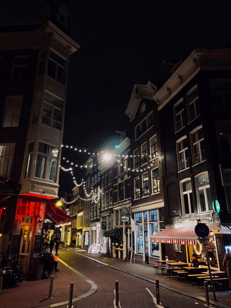 istock Streets of Amsterdam at night, Netherlands 1906740147
