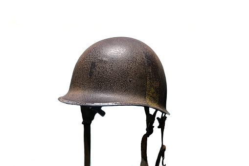 Detail of military helmet of the second world war type M2 on white background