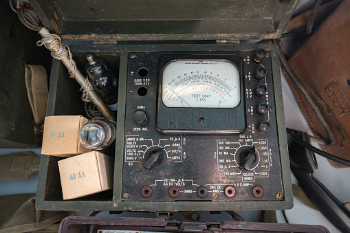 Saint Mere Eglise, France – October 14, 2023: Old military electronic device, it is a multimeter tester with an indicator needle