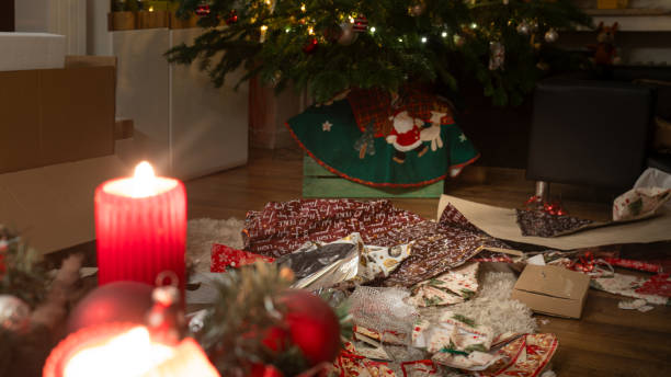 istock Much wrapping paper under the christmas tree 1906766278