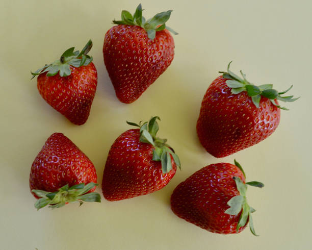 istock Fresh strawberries displayed against a colorful background 1906769699