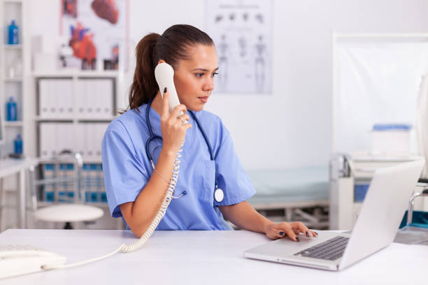 istock Medical practitioner answering phone calls 1906780450