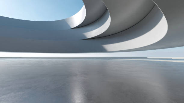 istock 3d render of abstract futuristic architecture with empty concrete floor. Scene for car presentation. 1906782546