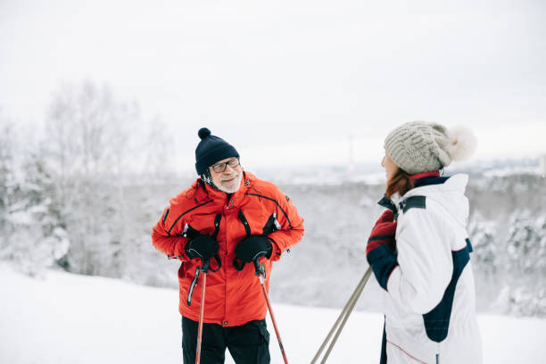 istock Senior couple taking a break from skiing 1906791461