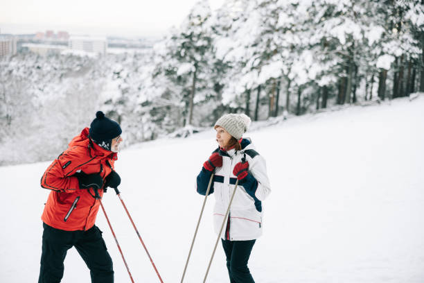 istock Senior couple taking a break from skiing 1906791467
