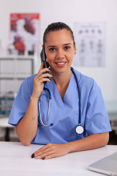 istock Medical staff talking with patient 1906793578