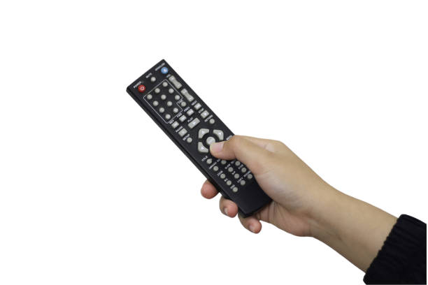 istock Asian woman's hand holding a remote control on White background. 1906797341