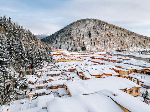 Aerial view Winter Season Snow Town Xuexiang with chinese lantern overcast weather deep snow