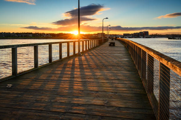 istock Sunset above Amble from South Jetty. 1906804798