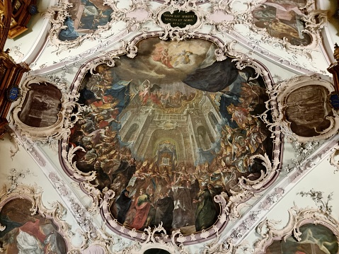 Abbey library of Saint Gall is a significant medieval monastic library located in St. Gallen, Switzerland. In 1983, the library, as well as the Abbey of St. Gall, were designated a World Heritage Site. the image shows the ceiling in the main room of the library.