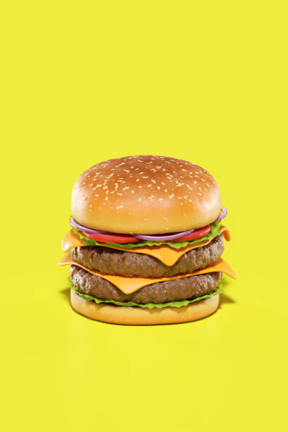 istock 3d render of a cheeseburger on yellow background. 1906841752