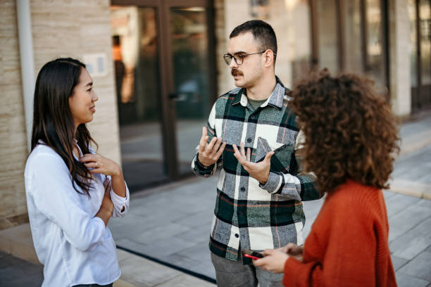 istock Colleagues are talking outdoors 1906903885