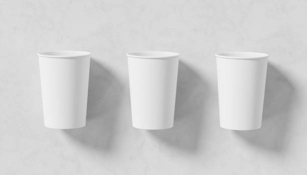 istock Paper coffee cup mock up. Paper coffee cup isolated on white background. 3D illustration 1906905425