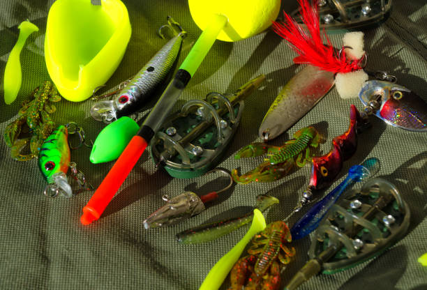 istock Fishing gear on a tarpaulin background. 1906921366