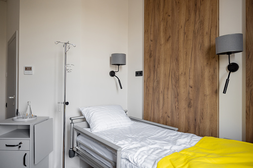 Modern and new private medical ward with comfortable bed
