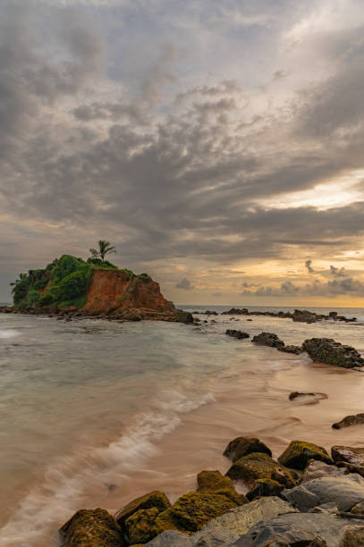 istock Parrot Rock Mirissa Beach at Sunset 1906940611