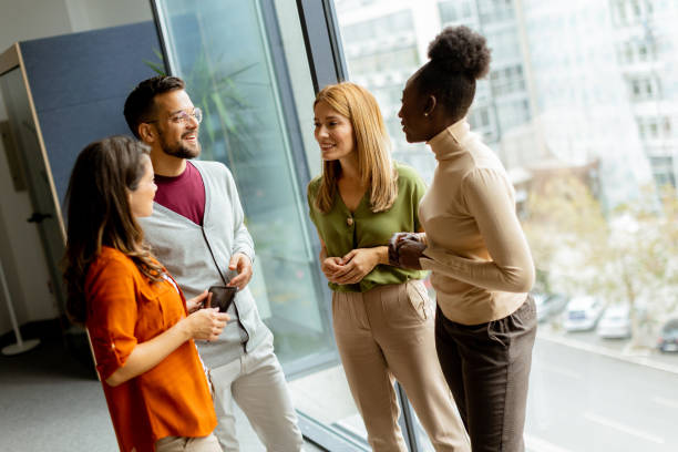 istock Young multiethnic startup team working in the modern office 1906989165