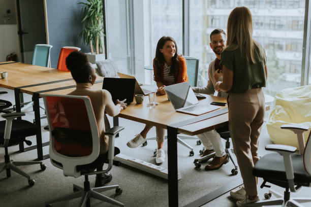 istock Young multiethnic startup team working in the modern office 1906989682