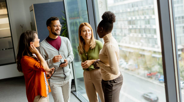 istock Young multiethnic startup team working in the modern office 1906989720