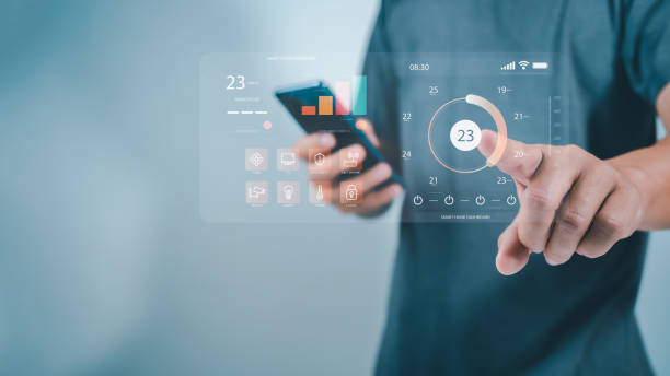 istock Human pointing fingers to use smart applications, Smart home concept, Smart home Automation Control System, Smart home dashboard interface control connected devices and set up automations. 1907006101