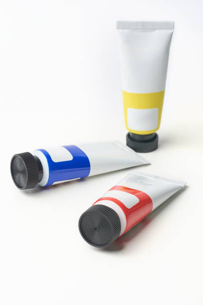 istock scattered artist's paint tubes isolated on white 1907023282