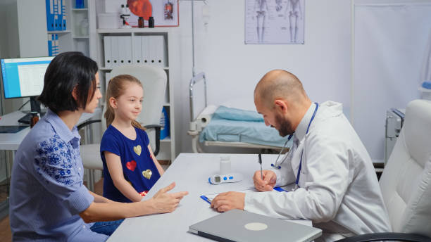 istock Doctor changing the treatment 1907023828