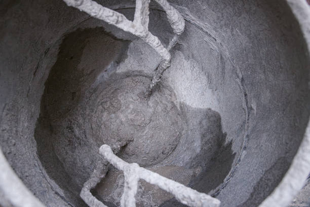 Cement mixing and making machine. Concrete mixer in action. Close up