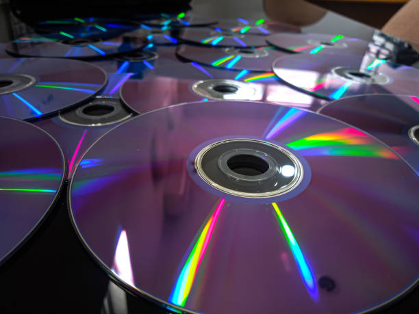 istock New CDs were scattered on the table 1907114396