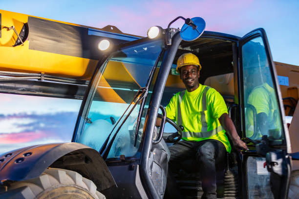 istock African-American worker in construction vehicle 1907137117