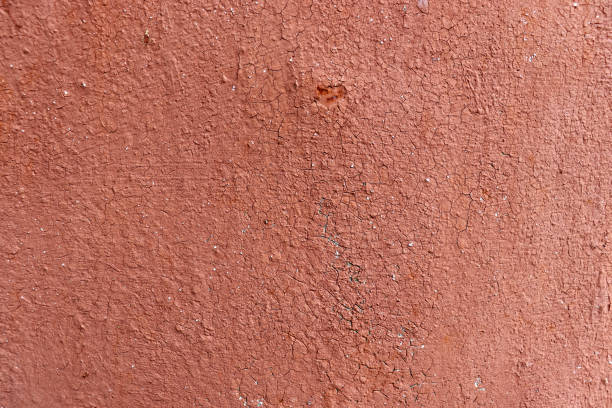 istock Old crack paint on wall. Red grunge texture 1907160349