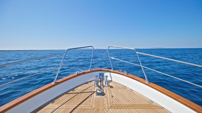 LD Bow of the yacht travelling at sea in sunshine