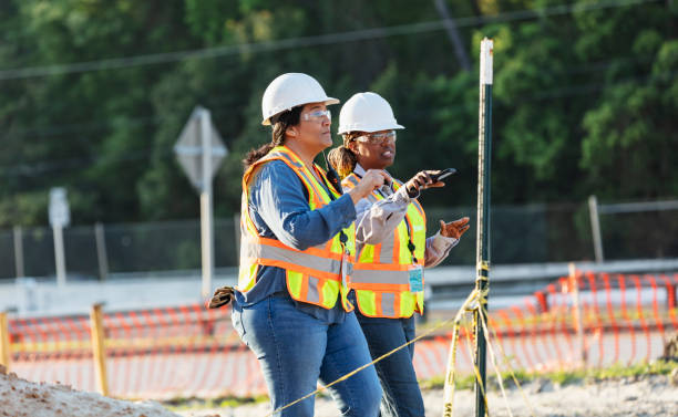 istock Two multiracial female construction workers at job site 1907187463