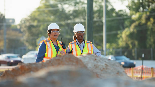 istock Two multiracial female construction workers at job site 1907187464