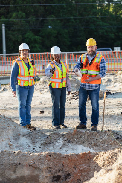 istock Diverse team of three construction workers at job site 1907188002
