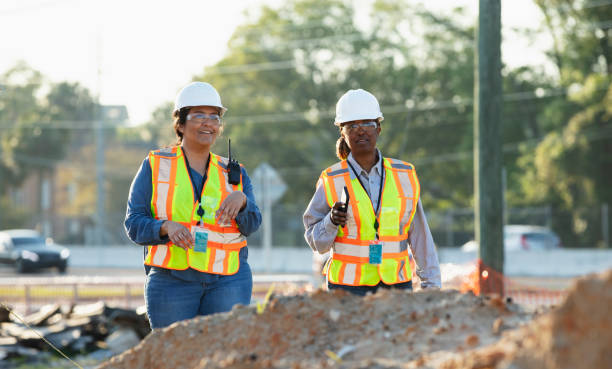 istock Two multiracial female construction workers at job site 1907190108