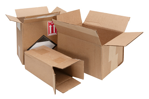 A selection of used cardboard boxes for recycle on white. Clipping path included