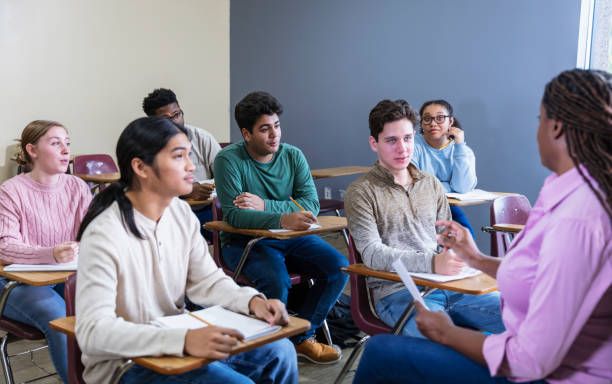 istock African-American high school teacher teaching class 1907342591
