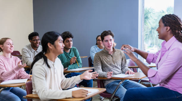 istock African-American high school teacher teaching class 1907342907