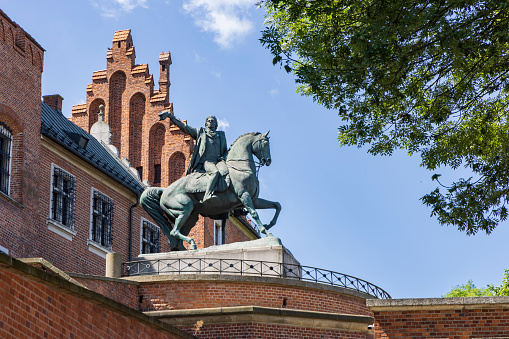 Krakow, Poland - July 18, 2023: Monument of Tadeusz Kosciuszko Polish hero of independence at the entrance of Royal Wawel castle in Krakow Malopolska region in Poland