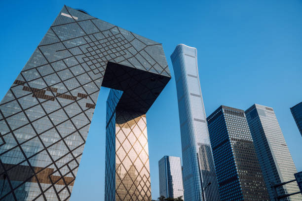 Beijing, China - October 11 2023: View of the landmark China Central Television (CCTV) tower in Beijing, China. Beijing's financial district comes to life with a stunning display of high-rise buildings, illuminating the cityscape with a blend of modernity and elegance.